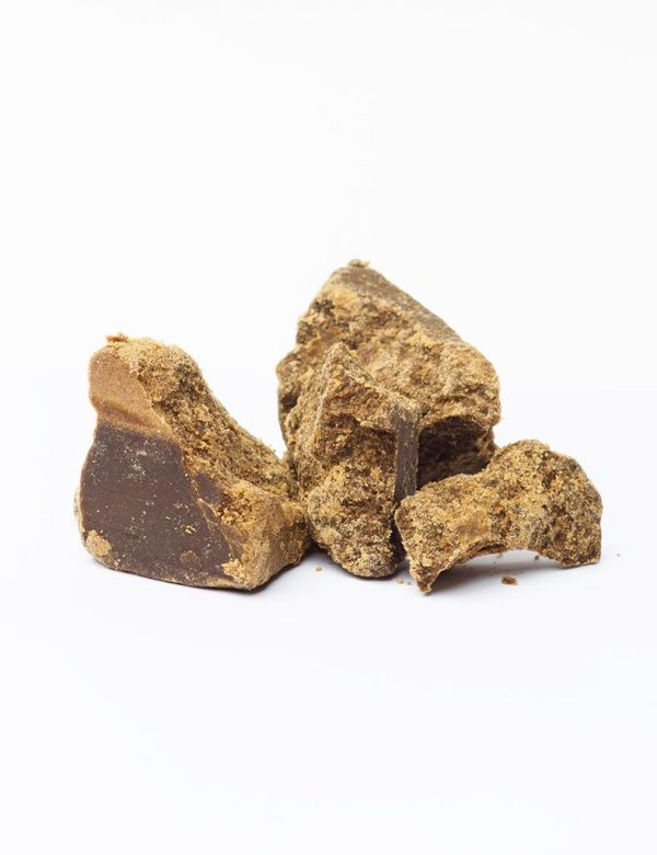 Närbild på CBD hash - Golden Ice Bubble hash